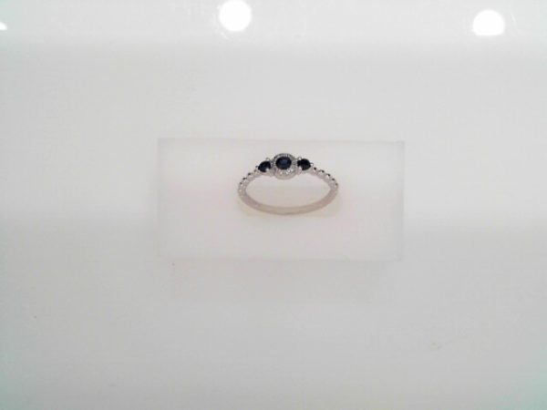 White GOLD  14 Karat  DIAMOND AND SAPPHIRE RING 


DTW=0.04 EACH