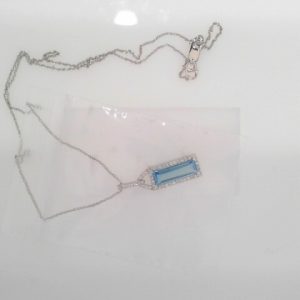 CSG 14KWG DIA & BLUE TOPAZ PENDANT DTW=0.12 EACH