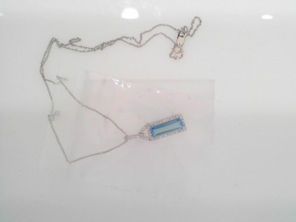 CSG 14KWG DIA & BLUE TOPAZ PENDANT DTW=0.12 EACH
