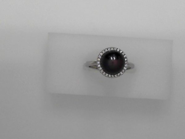 10mm Cultured peacock pearl with sterling silver and cubic zirconia - Size adjustableMade by 10mm cultured freshwater peacock pearl, sterling silver,and cubic zirconia. The size can be adjusted from size 5 to size 9.