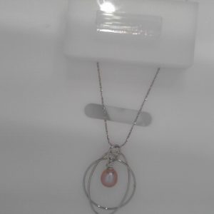 mm cultured pink pearl geo circular-oval pendant and sterling silver7mm cultured freshwater tear drop pink pearl and sterling silver pendant. The pearl is natural color with best luster and flawless. The diameter of the sterling silver circle is 24mm an