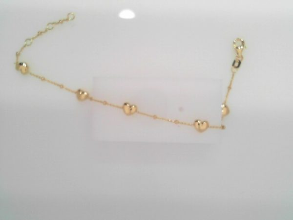 ADJ SATURN BRACELET WITH/ PUFF HEARTS STATIONS TOTAL WEIGHT = 1.88 GRAMS