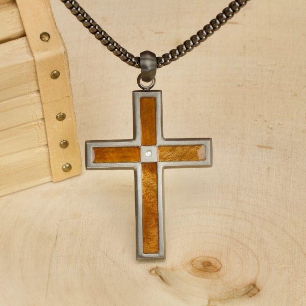 Gun Metal IP Steel Matte Finish Whiskey Barrel Wood Inlay with Lab-Grown Diamond Cross Pendant.

made from repurposed American White Oak barrels, this pendant captures the essence of storied spirits. Sealed with medical-grade resin to preserve the wood'