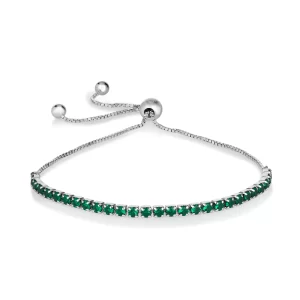 Elevate your wrist game with our exquisite adjustable bolo bracelet. Adorned with 2 mm diamond crystalline, this versatile piece offers a perfect fit for most sizes, adding a touch of glamour to any ensemble.Stone Type: Green EmeraldGem Origin: Lab