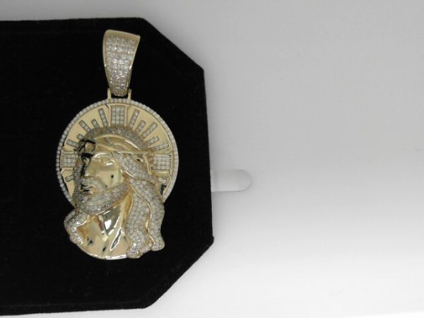 STERLING SILVER GOLD PLATED JESUS   23.2 GMS
